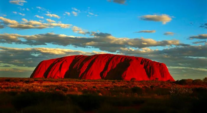 Uluru, formerly known as Ayers Rock, is a profound spiritual symbol of Australia, located in the heart of the country.