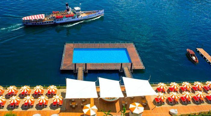 One of the pools at Grand Hotel Tremezzo is uniquely positioned above the serene waters of Lake Como.