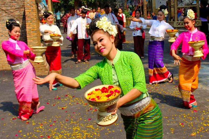 Traditional dancers grace the stage during the Songkran opening ceremony in Chiang Mai, located in Thailand’s northern region.