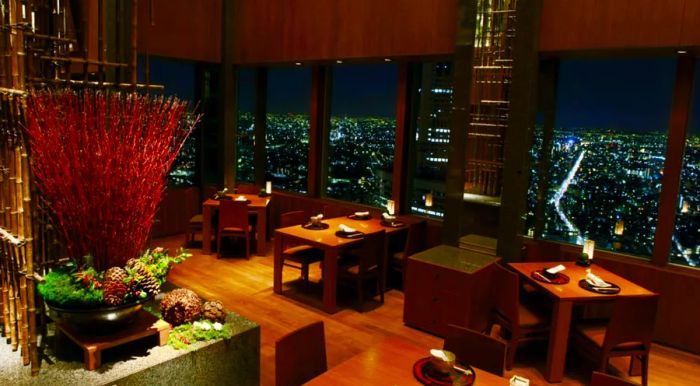 While the bar at Park Hyatt Tokyo may have more fame, its upscale restaurant offers equally spectacular views.