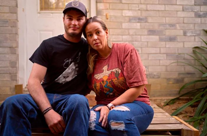 Crain’s boyfriend, Randall Broussard, and her mother, Fails, at their home in Vidor, Texas.