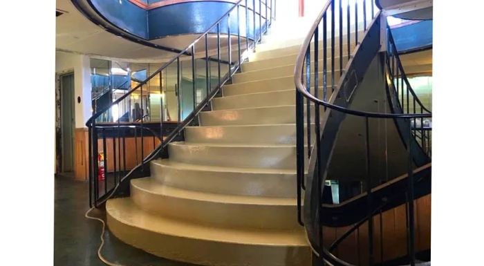 A grand staircase aboard the ship, now renamed the Aurora by Willson.