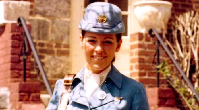 Jocelyne, dressed in her uniform, proudly wore her gold wings.