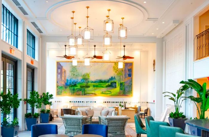 The Loutrel features a veranda-style lobby and rooms adorned with shades of blue, green, and gold.