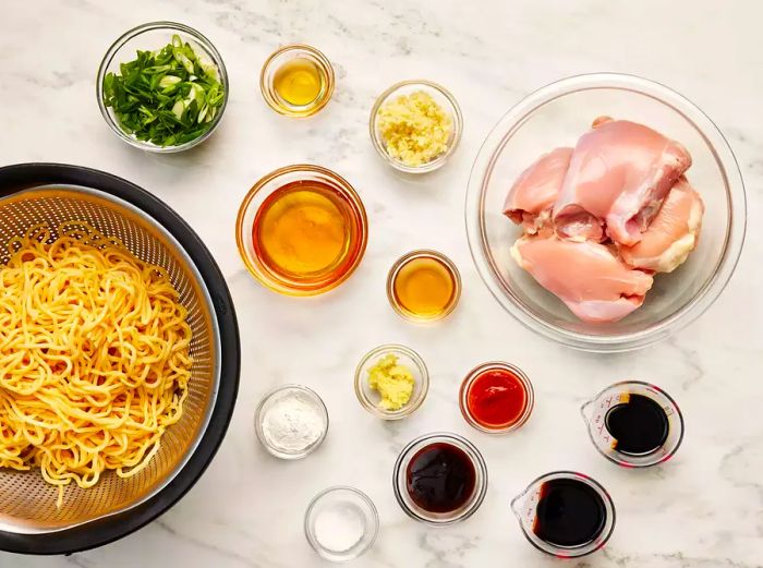 Ingredients ready for making slow cooker honey garlic chicken noodles