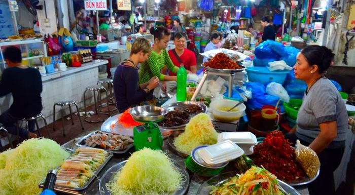 Hanoi's signature dishes include pho bo (beef noodle soup), bún chả (grilled pork with vermicelli noodles), and banh mi (French baguette filled with grilled pork or savory pâté).