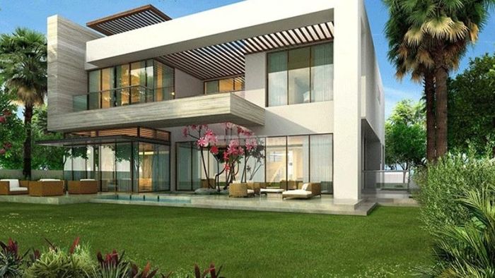 Nhà 2 tầng 1 tum mái tôn có thiết kế sân vườn