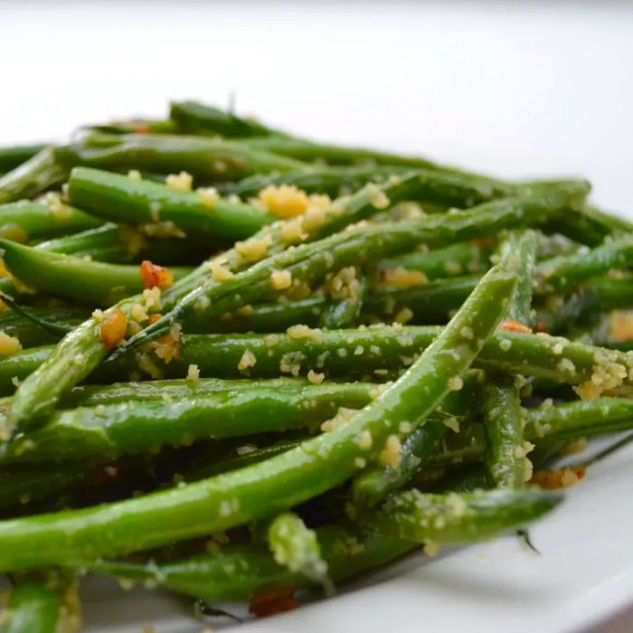 green beans served on a white plate