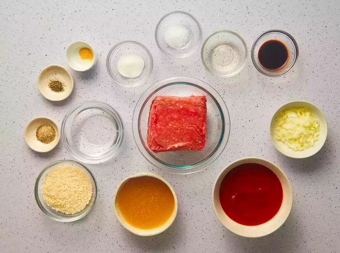 Place all the ingredients for the porcupine meatballs into separate small bowls on the kitchen counter for easy access.