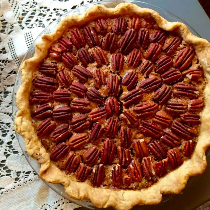 Caramel Pecan Pie on a lace placemat