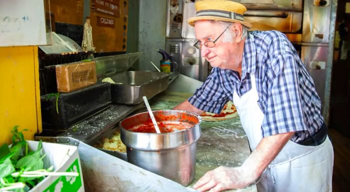 Dom DeMarco has been crafting pizzas at Di Fara in Brooklyn since 1965.