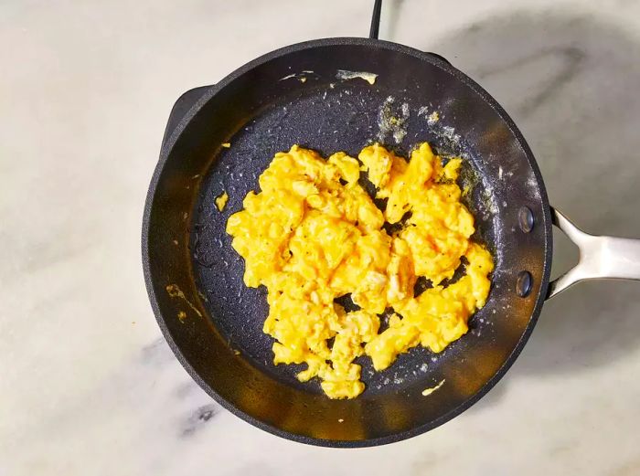 Scrambled Eggs cooking in a skillet