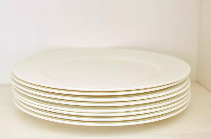 Plates Stored on Kitchen Shelves