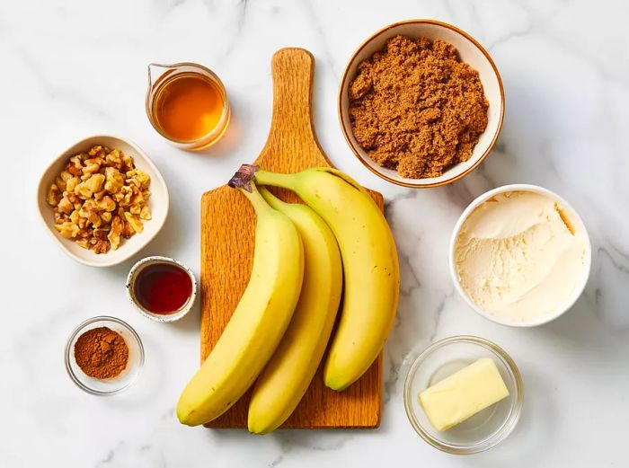 An overhead shot of all the ingredients needed for making Bananas Foster.