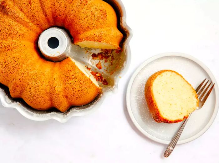 A no-fail pound cake with a slice cut out.