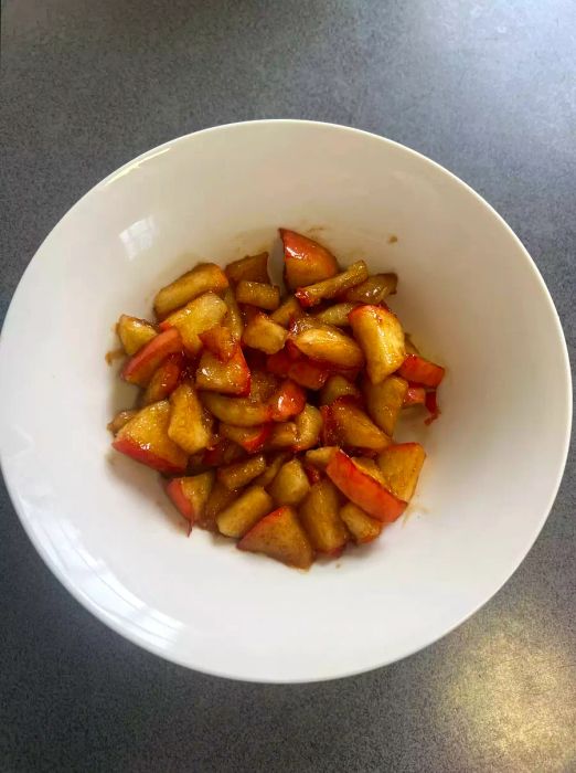 Cinnamon apples in a white bowl