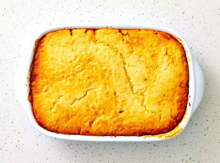 Freshly baked Sloppy Joe Cornbread Casserole resting on the counter