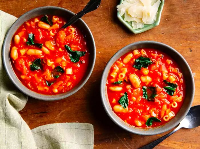 Two Bowls of Soup on a Countertop