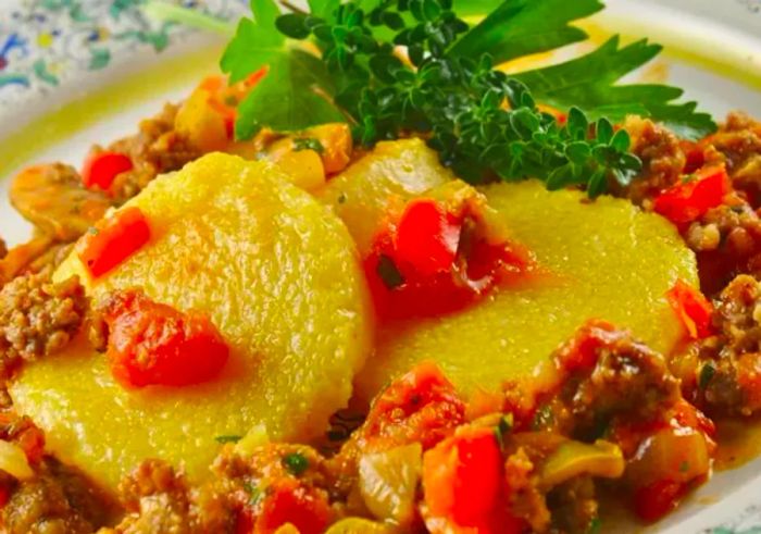 Polenta with Spicy Sausage and Vegetable Sauce