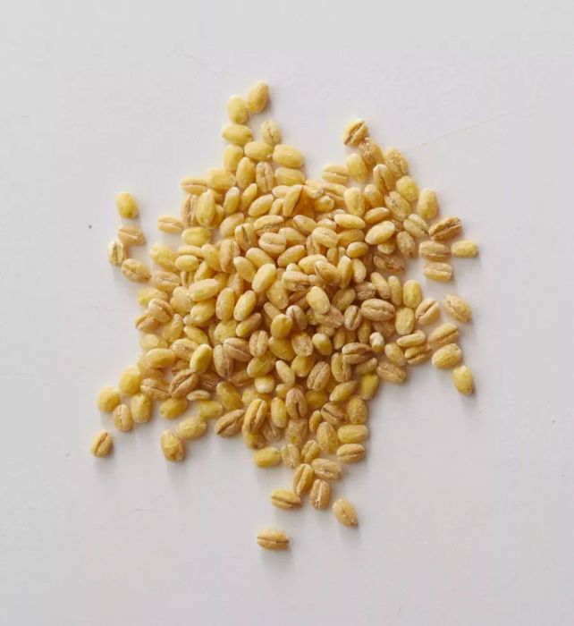 Hulled barley retains its bran and germ, making it a whole grain. It’s packed with nutrients but requires a longer cooking time. You can reduce the cooking time by soaking it for a few hours beforehand. This variety can be found at most health food and well-stocked grocery stores.