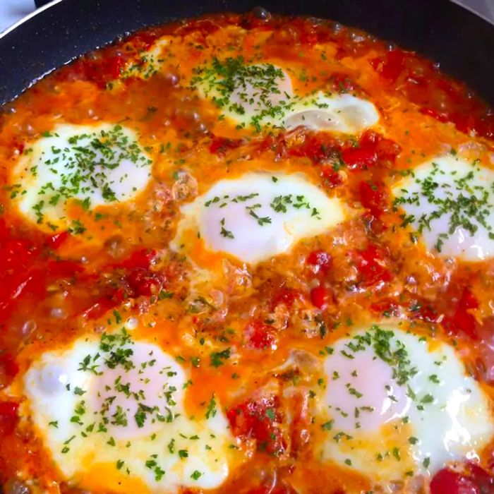 A close-up of Chakchouka (Shakshouka) in a pan