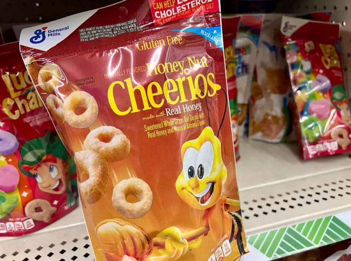 Honey Nut Cheerios and Lucky Charms on the shelf at Dollar Tree