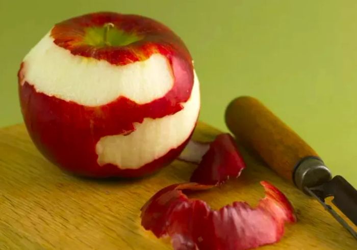 Peeling a Cortland apple