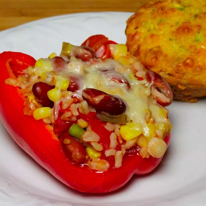 Stuffed peppers filled with beans, rice, and cheese