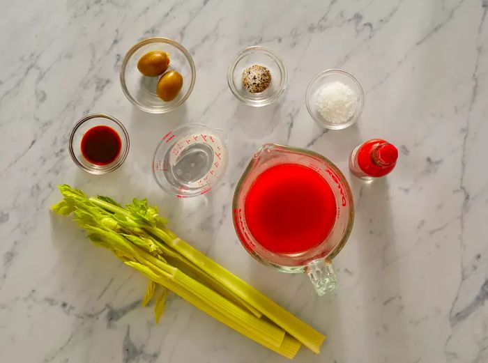 Top-down view of the pre-measured ingredients ready to be mixed into a Bloody Mary.