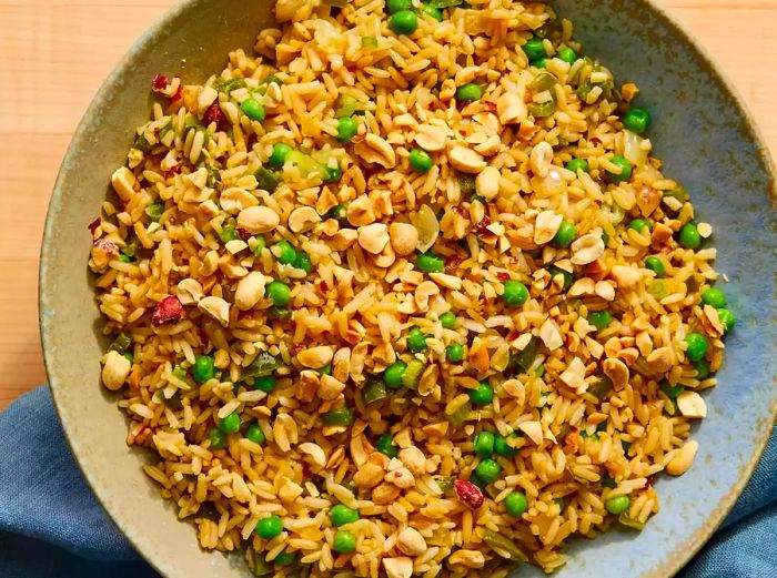 Looking down at a large bowl of vegetable fried rice