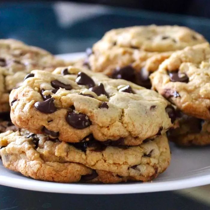 Chocolate chip cookies arranged on a white plate