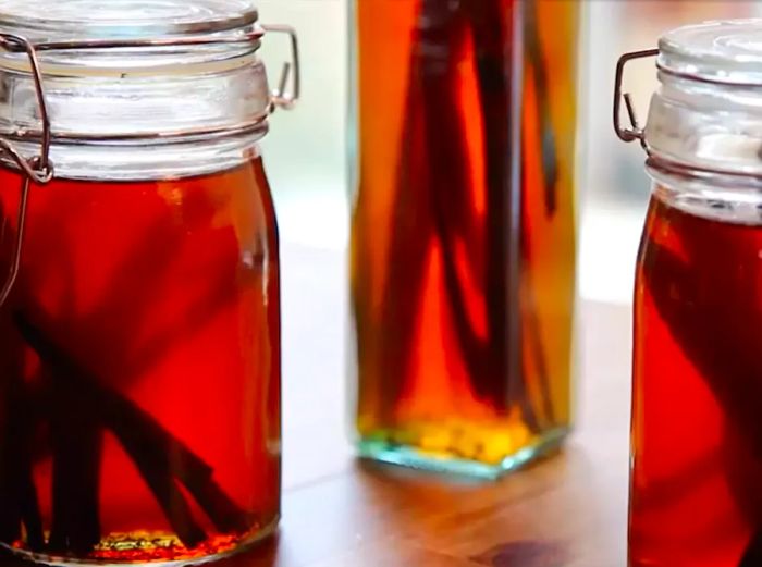 Low-angle shot of homemade vanilla extract bottles