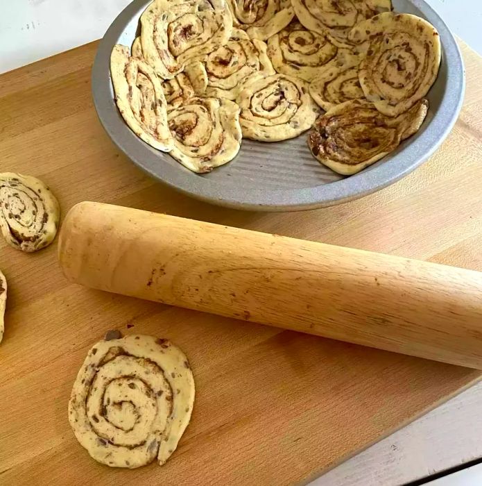 canned cinnamon roll dough flattened and pressed into a pie dish, creating a quick pie crust.