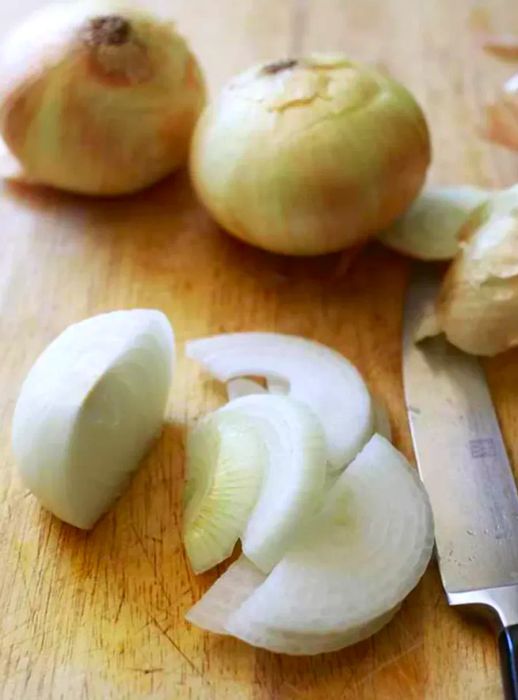 Sliced onions ready for caramelization.