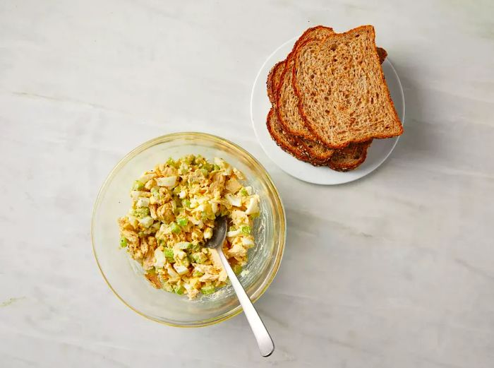 Tuna Salad in a Bowl with Spoon Ready to Serve