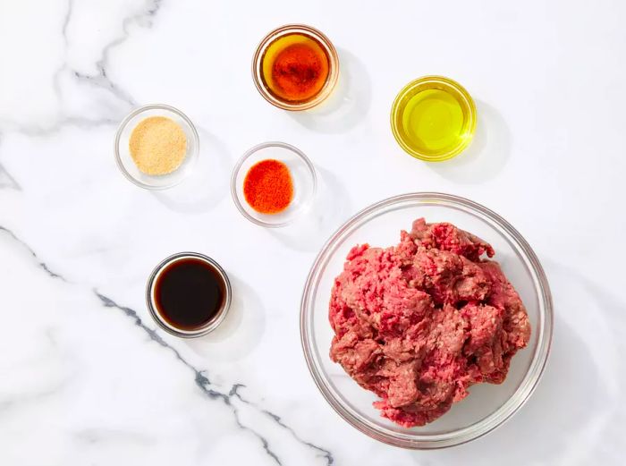 Ingredients for Grilled Hamburgers in Glass Bowls