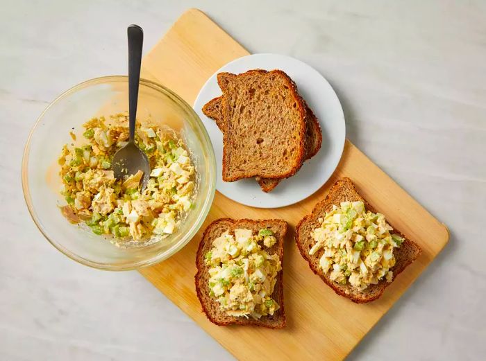 Tuna Salad Spread Across Slices of Bread