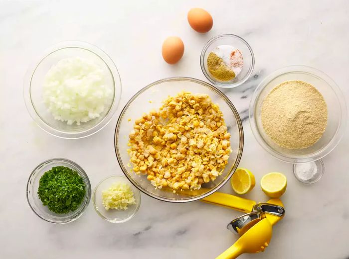 Aerial view of all the ingredients needed for falafel with canned chickpeas