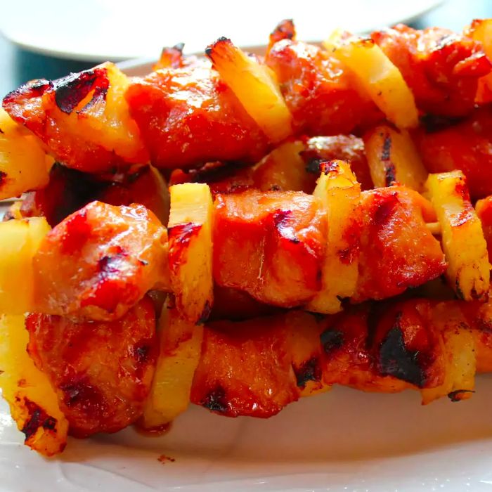 Close-up view of kabobs with pineapple on skewers