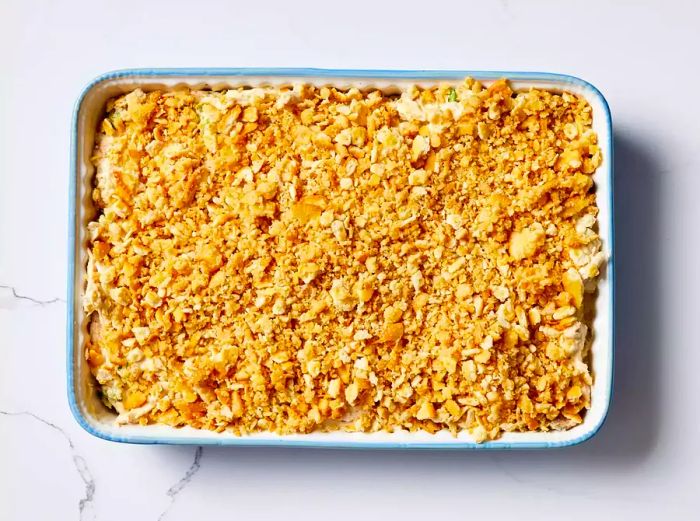 An unbaked Ritz Cracker Chicken Casserole ready to go into the oven.