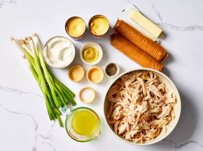 Ingredients for Ritz Cracker Chicken Casserole laid out on a countertop