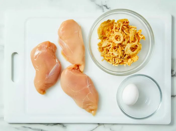 All the ingredients are ready for making crispy French onion chicken.