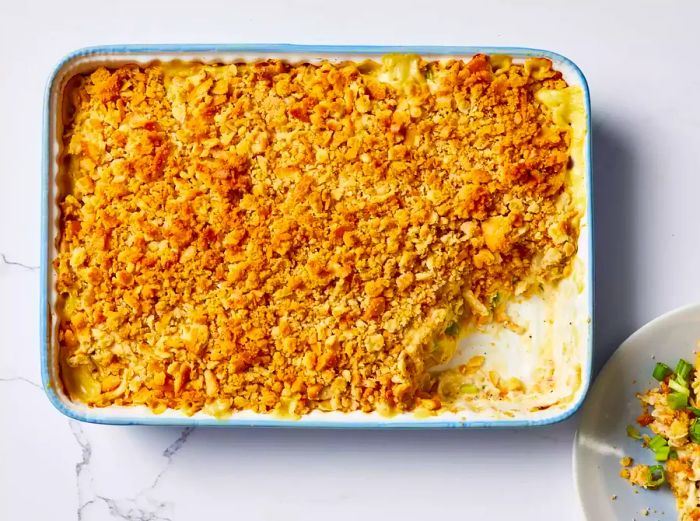 Ritz Cracker Chicken Casserole in a baking dish, ready to bake.