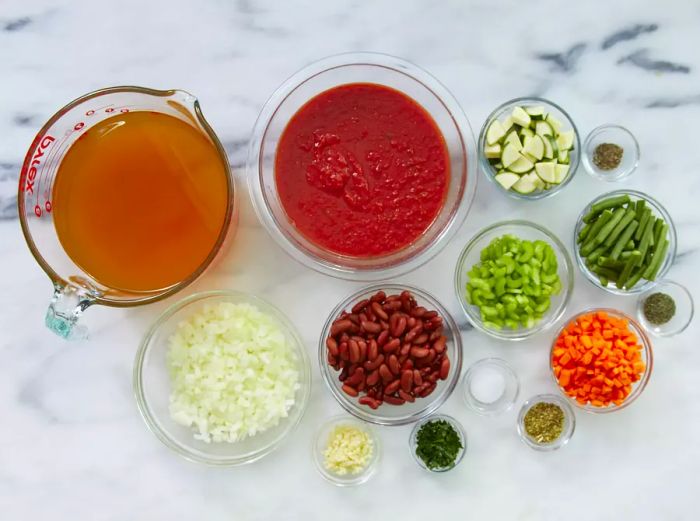 All the ingredients are prepared and ready for the slow cooker vegetarian minestrone soup.