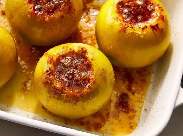 close-up of a baking dish filled with baked apples