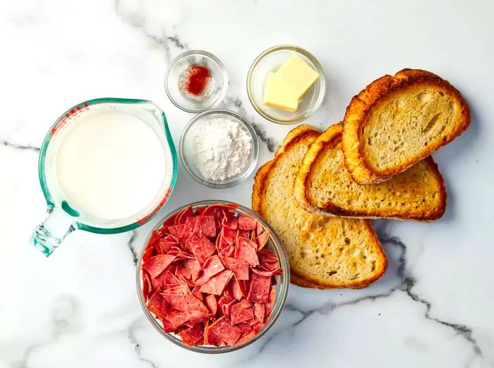 Ingredients for making creamed chipped beef on toast