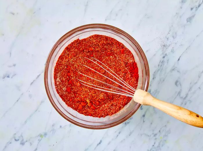 Dry ingredients in a bowl with a whisk