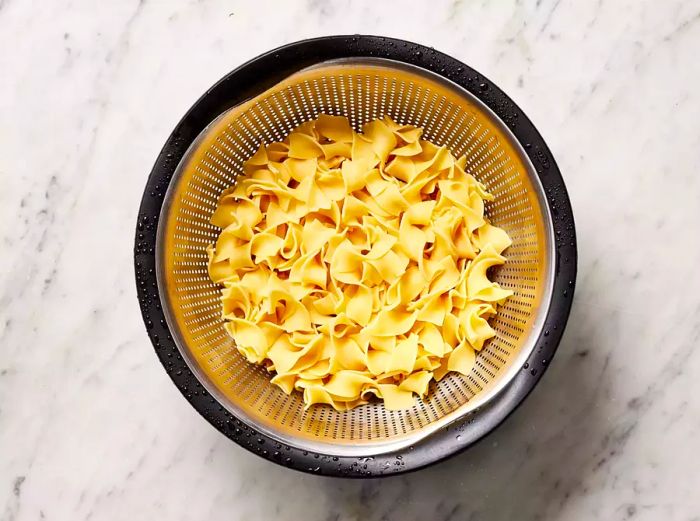 Egg noodles boiled and drained.