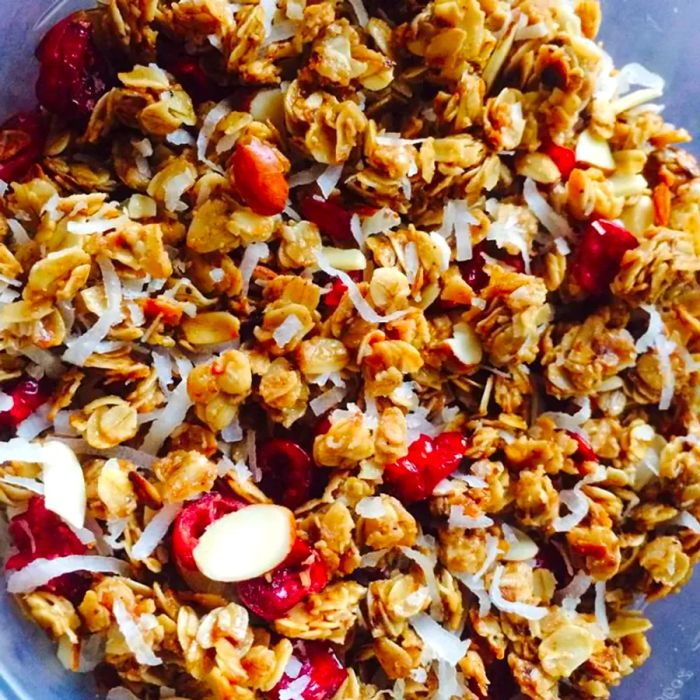 A close-up shot of Stovetop Granola stored in a plastic container.