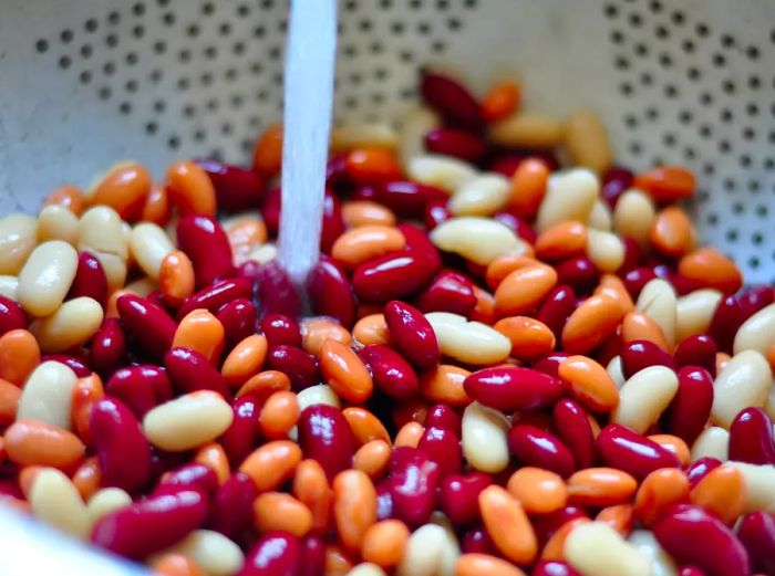 Close-up shot of vibrant beans in a colander